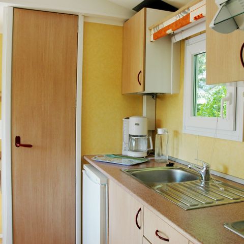 Mobilheim 4 personen - Holz-Mobilheim BABY mit KLIMA - 26m² mit überdachter Terrasse / 2 Zimmer