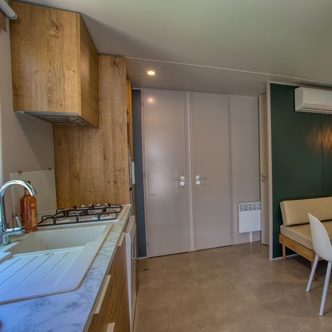 Mobilheim 4 personen - Premium O'Hara 29-31m² (2Sch-4Pers) + Halbüberdachte Terrasse + Klima + LV + TV