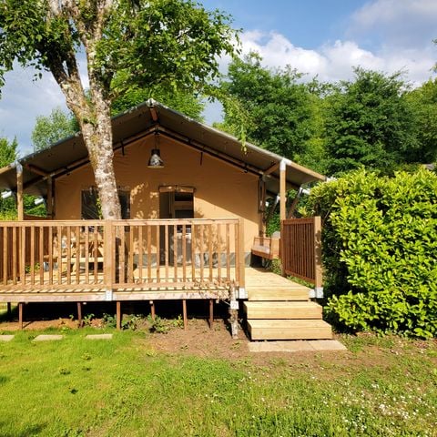 Safaritent 4 personen - NIEUW 2023 Lodge Safari: een glamping tent met sanitair en een groot terras