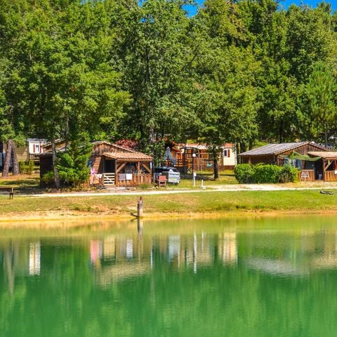 CHALET 4 personnes - Chalet devant l'étang 1/4 pers. 1/4 pers