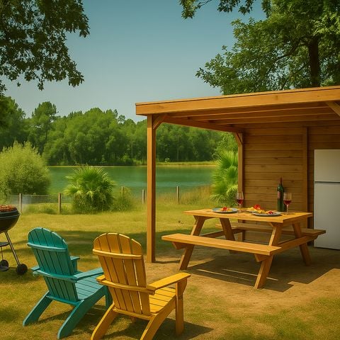 Pitch -  Premium pitch with pond view 1/2 pers