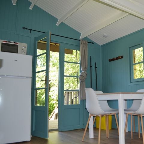 Hébergement 4 personnes - Chalet sur pilotis - 2 chambres - Bord de rivière