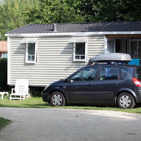 Mobile home 4 persons - Le Châtaignier 29m² (2 bedrooms) + integrated terrace + TV, free WIFI*.