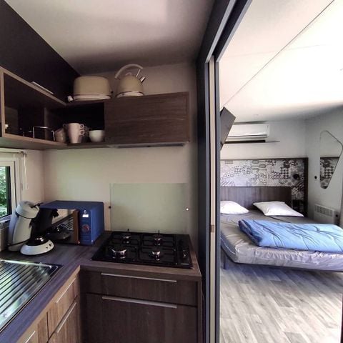 Stacaravan 3 personen - Hotel 1 kamer (bed 160 + bank) DIM/DIM