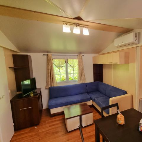 Mobilheim 6 Personen - Mobilheim Premium 22-28m² - 2 Schlafzimmer + TV + Überdachte Terrasse & Einwegbettwäsche vorhanden* 4/6 Pers.