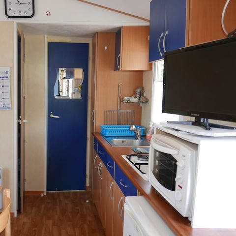 Stacaravan 4 personen - 2 kamers + 10 jaar