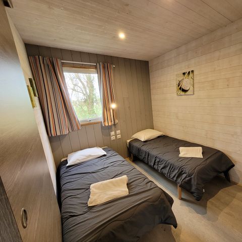 Chalet 4 Personen - PREMIUM 36m² (2 Schlafzimmer) darunter eine überdachte Terrasse 6m²