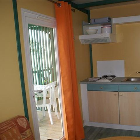 Chalet 2 personen - Half vrijstaand chalet 16m² - 1 kamer + overdekt terras 8m² 2 personen