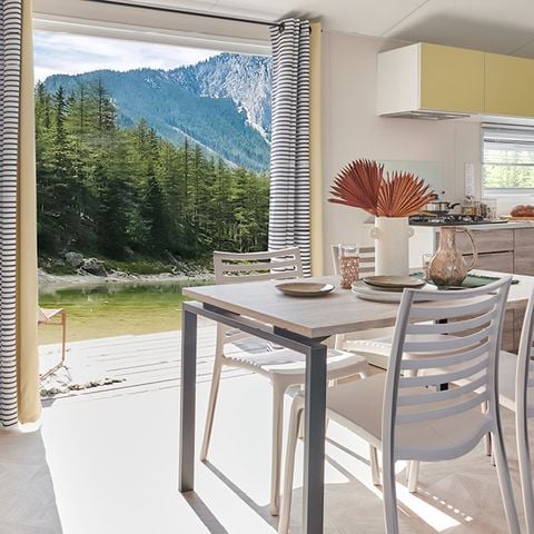 Mobilheim 4 Personen - Premium 33m2 (2Bett-4 Pers.) + halboffene Terrasse + TV + LV + Bettwäsche inbegriffen