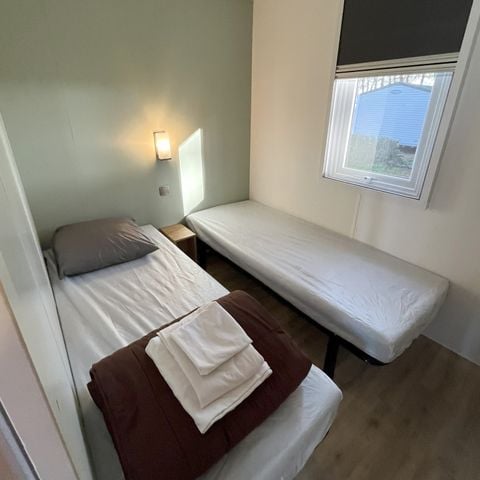 Stacaravan 4 personen - - van 25m² tot 33m² - 2 kamers - overdekt/semi-overdekt terras - terras met tuinmeubelen