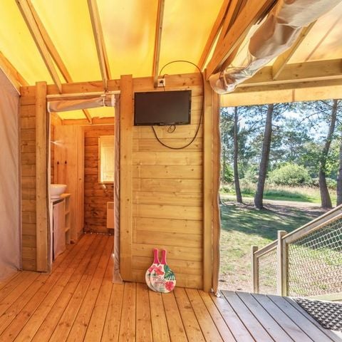Originale 5 persone - INSOLITE 25-2 (Cabane sur pilotis Ecologe) >10 anni; max 4 adulti (letti a castello) TV