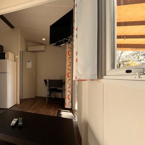 Mobile home 2 persons - Comfort: 21m² 1-bedroom - 12m² semi-covered terrace - TV - Air conditioning