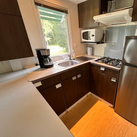 Mobilhome 6 personnes - Confort 38m² - 3 chambres - TV - Terrasse couverte 18m² - 2 salles de bains