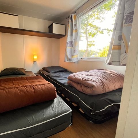 Mobilhome 6 personnes - Confort 38m² - 3 chambres - TV - Terrasse couverte 18m² - 2 salles de bains