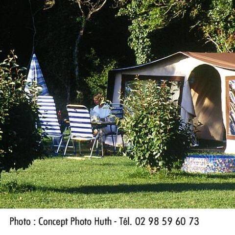 PLOT - Spacious, semi-sheltered camping pitches, each with water and electricity.