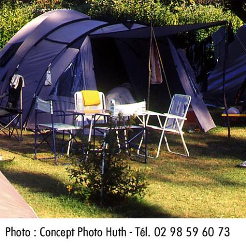 PLOT - Spacious, semi-sheltered camping pitches, each with water and electricity.