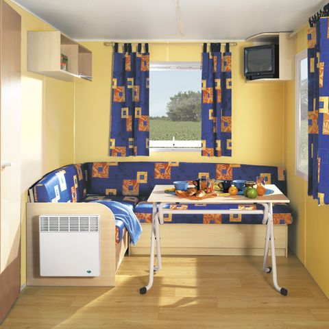 Mobilhome 2 personnes - Standard 17m² (1 chambre) + terrasse intégrée couverte 9m² + TV 2/3 pers