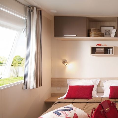Mobilhome 5 personnes - remium 30m² (2 chambres) + terrasse couverte 10m² + draps + serviettes + LV + TV 4/5 pers.