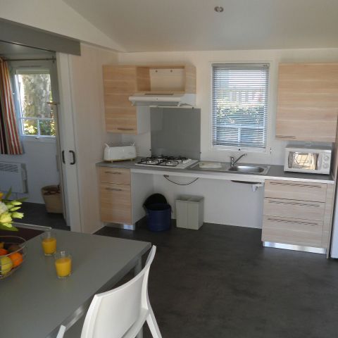 BUNGALOW 4 personnes - Standard 32m² - 2 chambres + terrasse non-couverte - PMR
