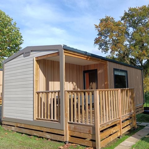 Mobilheim 4 personen - Komfort 24.2 m² - 2 Zimmer - Integrierte Terrasse - Nähe Spielplatz