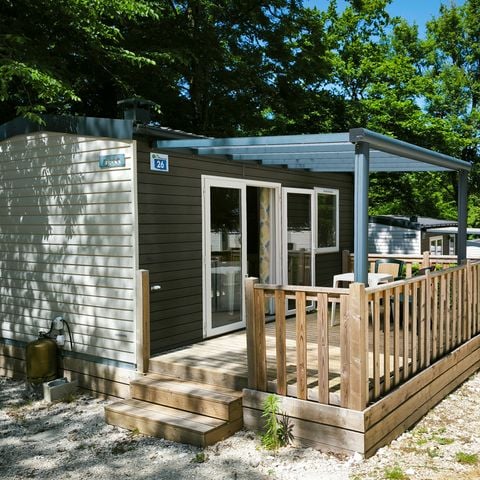 Mobilhome 2 personnes - Confort 22m² - 1 chambre - Terrasse semi-couverte 12m² - TV - Clim