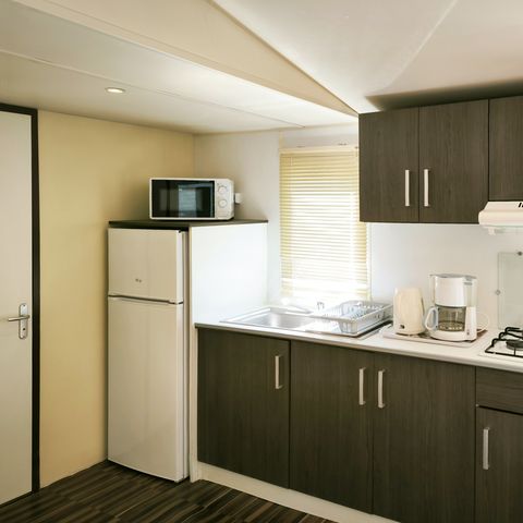 Mobile home 4 persons - Confort 32m² - 2 bedrooms + terrace + TV + Air-con