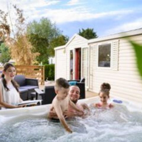 Bungalow 2 Personen - 14-Bungalow du Gorguet 40m2 (2Sch -2/6Pers.) + Jaccuzzi + gemachte Betten + Handtuch + Getränkeset + TV - Preis für 2 Personen