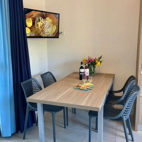 Appartement 6 personen - PREMIUM (begane grond met klein terras)