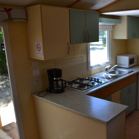 BUNGALOW 4 personnes - Mobil home Confort 2 chambres 28m² + terrasse 9m² + climatisation + TV 4 pers
