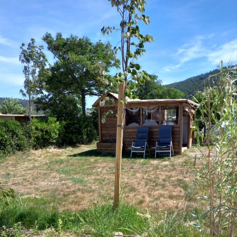 PLOT - Freecamp package (1 tent, caravan and 1 car or camper van / 16A electricity) + sanitary facilities for 2/6 people