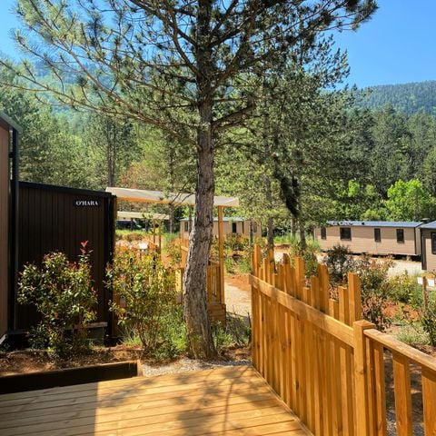 MOBILHOME 4 personnes - Cottage 33m² Confort - 2 chambres + Terrasse semi-couverte + TV + 2SDB + Vue Lac 4 pers