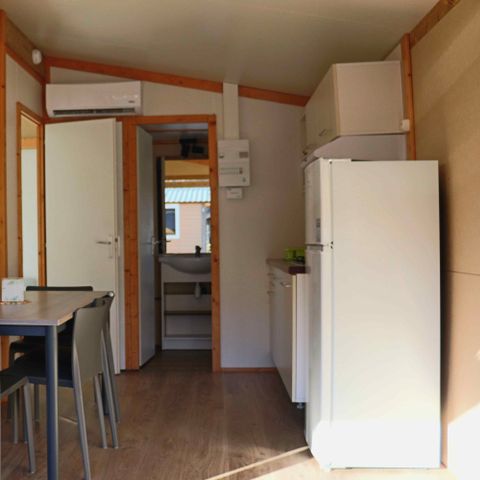 CHALET 4 persone - Chalet sul lago, 28 m², categoria “Comfort” – 2 camere da letto + terrazza integrata + TV, 4 persone