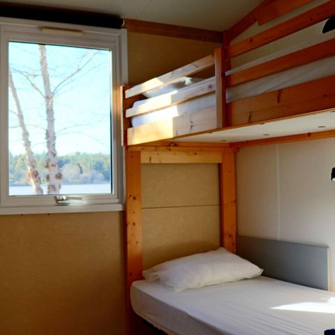 CHALET 4 persone - Chalet sul lago, 28 m², categoria “Comfort” – 2 camere da letto + terrazza integrata + TV, 4 persone