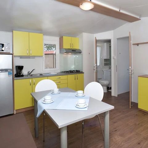 Mobilhome 4 personas - Habitación «Superior» en casa móvil con vistas a la piscina