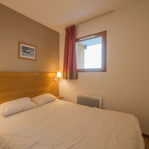 Piso 6 personas - 2 habitaciones con zona de dormitorio para 6 personas
