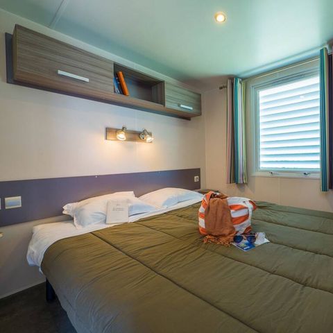 Bungalow 4 personen - Mobilheim | Comfort | 2 Zi. | 4 Pers. | Erhöhte Terrasse | TV