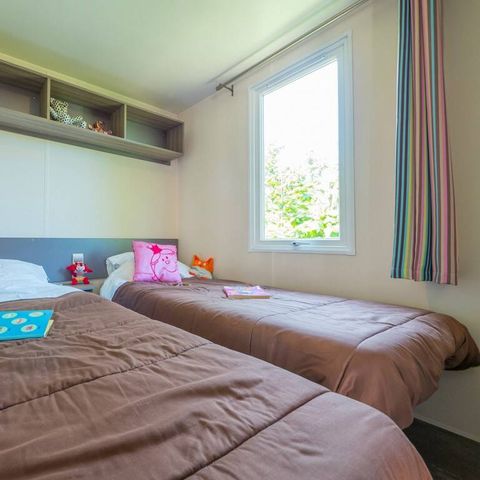 Bungalow 4 personen - Mobilheim | Comfort | 2 Zi. | 4 Pers. | Erhöhte Terrasse | TV