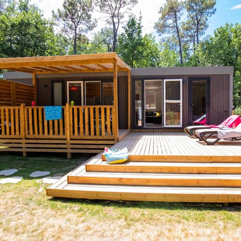Bungalow 6 personen - Mobilheim | Premium Exclusive | 3 Zi. | 6 Pers. | Erhöhte Terrasse | 2 Bad | Klimaanlage | TV