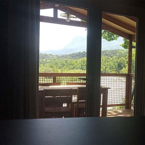 TIENDA DE LONA Y MADERA 5 personas - Lujoso alojamiento natural con vistas panorámicas al río - aire acondicionado