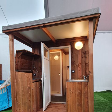 PLOT - Premium pitch for tents, caravans and motorhomes with private sanitary facilities + kitchen area