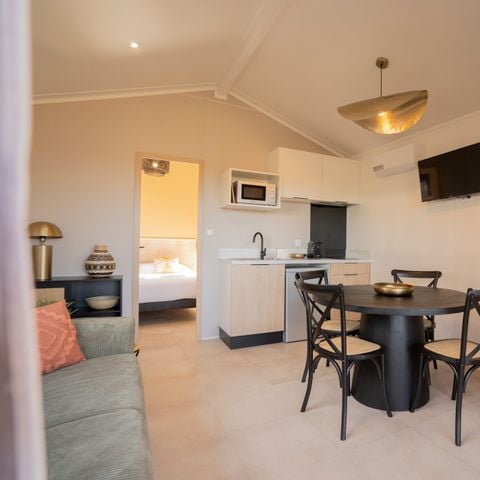 LODGE 4 personnes - Lodge Ethnique (sans spa) 1 chambre + canapé convertible séjour