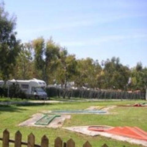 PLOT - A motorhome, caravan or tent of any size.