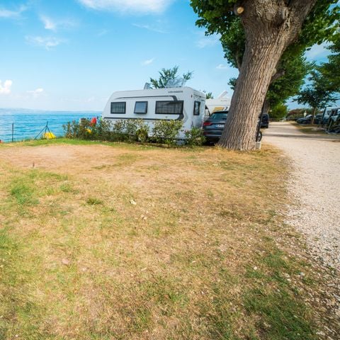 Kampeerplaats - Standplaats met uitzicht op het meer 60 m²