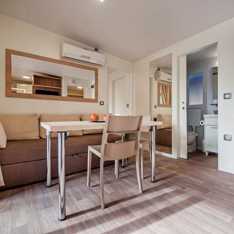 BUNGALOW 4 personnes - Comfort XL | 2 Ch. | 4 Pers. | Terrasse surélevée | 2 SDB | Clim. | TV